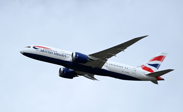 epa09175525 A British Airways aircraft (Boeing 787-8 Dreamliner, Tail number G-ZBJF) takes off at Heathrow Airport in London, Britain, 03 May 2021. Holidays abroad are set to resume on 17 May if the g ...