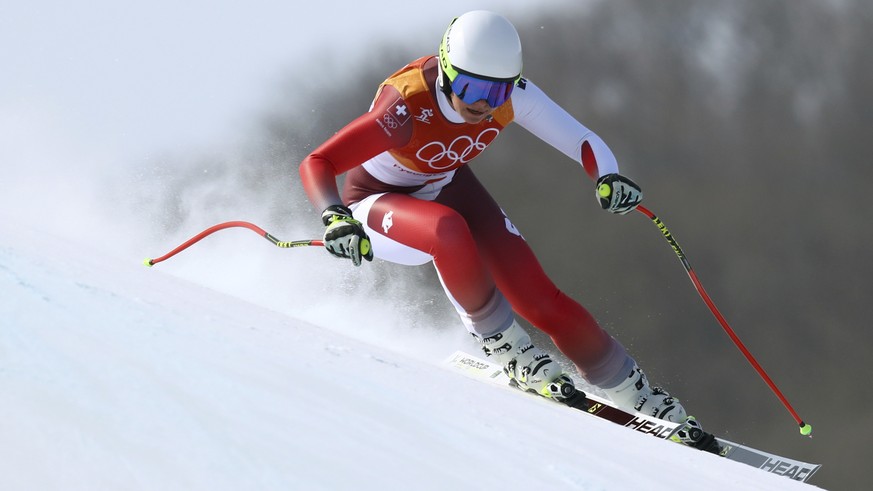 Switzerland's Corinne Suter competes in the women's downhill at the 2018 Winter Olympics in Jeongseon, South Korea, Wednesday, Feb. 21, 2018. (AP Photo/Alessandro Trovati)
