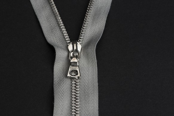 The &quot;Riri&quot; zipper, a Swiss product of the company Riri and the first zipper manufactured on a series-production basis, pictured on June 11, 2013, in Zurich, Switzerland. (KEYSTONE/Christian  ...