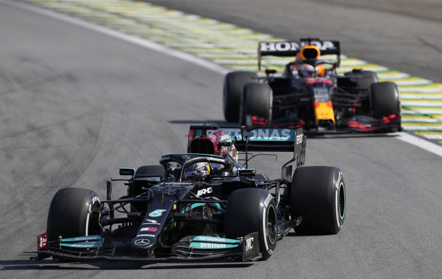 Mercedes&#039; Lewis Hamilton, front, steers his car followed by Red Bull&#039;s Max Verstappen , during the Brazilian Formula One Grand Prix at the Interlagos race track in Sao Paulo, Brazil, Sunday, ...