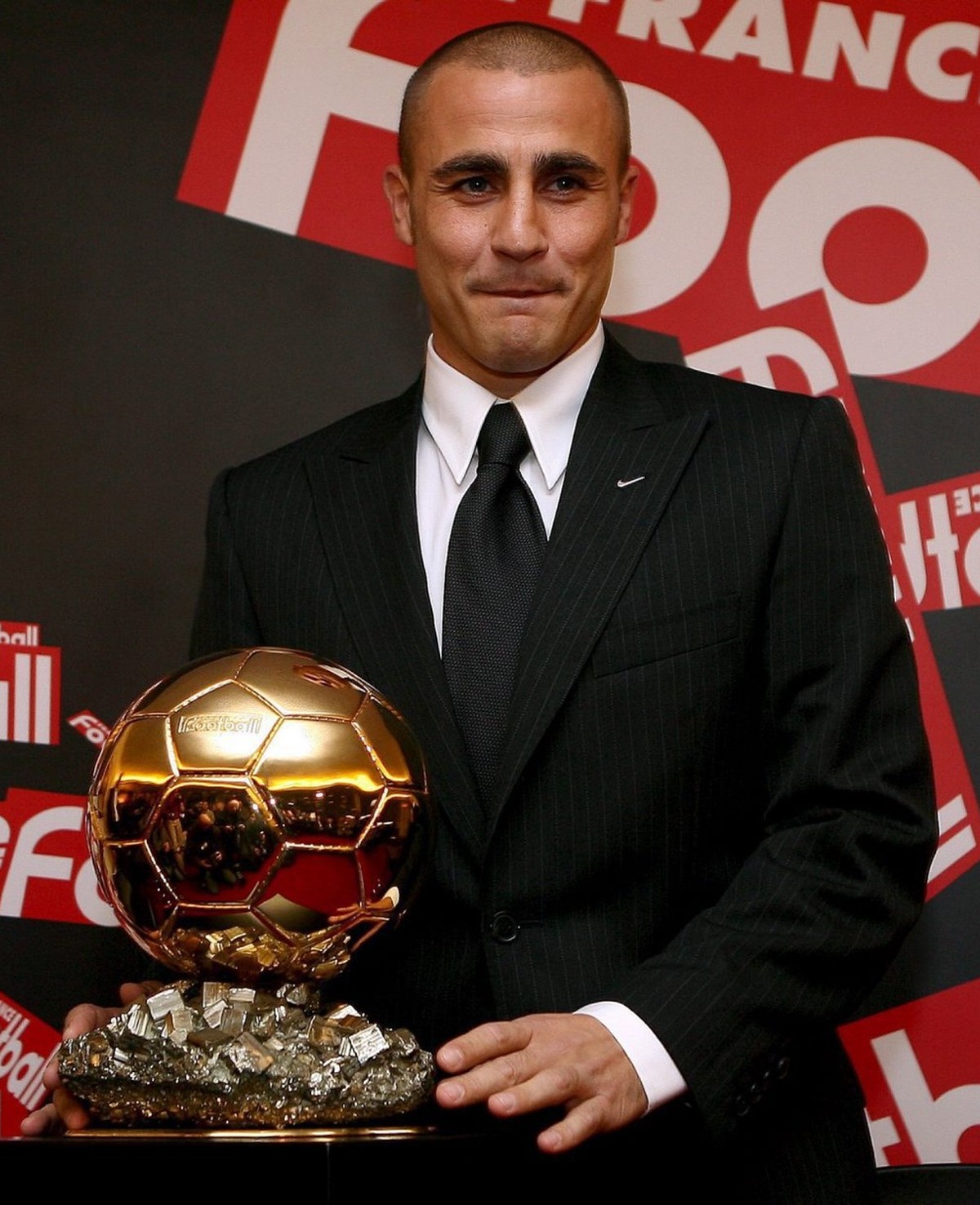 EMBARGO: NO USAGE BEFORE 19:45 CET ON 27 NOVEMBER 2006!

Italien soccer player Fabio Cannavaro poses during a press conference in Issy-les-Moulineaux, close to Paris, on Monday 27 November 2006. The 3 ...