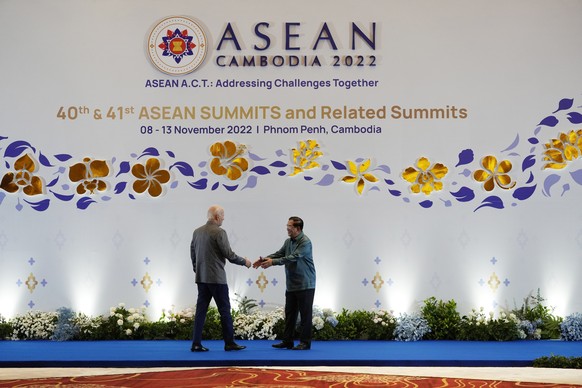 U.S. President Joe Biden, left, is greeted by Cambodia&#039;s Prime Minister Hun Sen before the Association of Southeast Asian Nations (ASEAN) gala dinner, Saturday, Nov. 12, 2022, in Phnom Penh, Camb ...