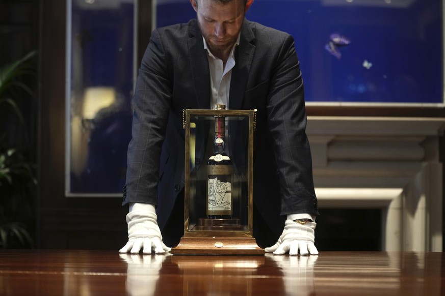 FILE - A view of a bottle of Macallan Adami 1926 whisky, on display during a media preview at Sotheby&#039;s auction house, in London, Thursday, Oct. 19, 2023. A bottle of Scotch whisky billed as ?the ...