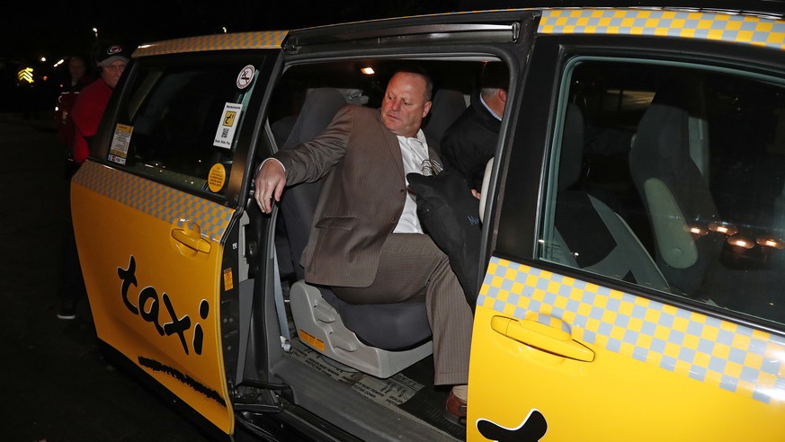 Gerard Gallant, former Florida Panthers head coach, gets into a cab after being relieved of his duties following an NHL hockey game against the Carolina Hurricanes, Sunday, Nov. 27, 2016, in Raleigh,  ...