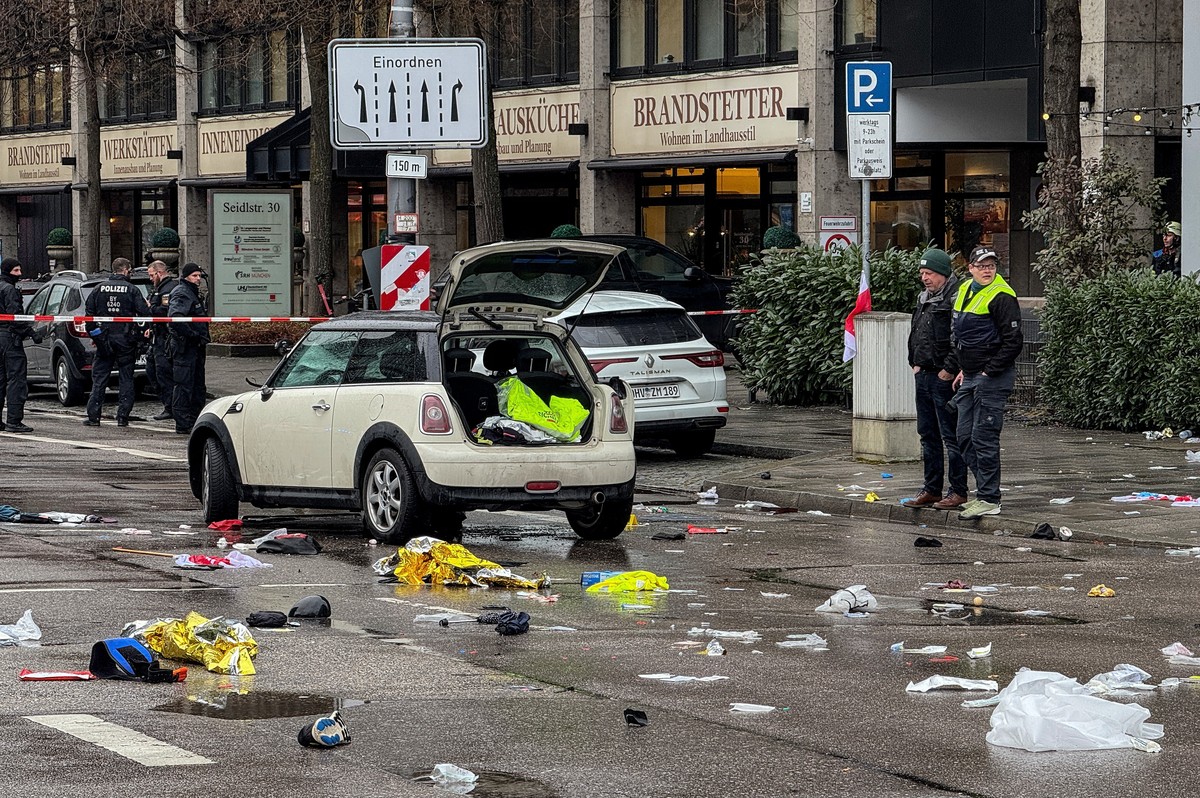 epa11892682 Emergency services at the scene after a car was driven into a group of people attending a Ver.di union demonstration in Munich, Germany, 13 February 2025. According to statements by the Mu ...