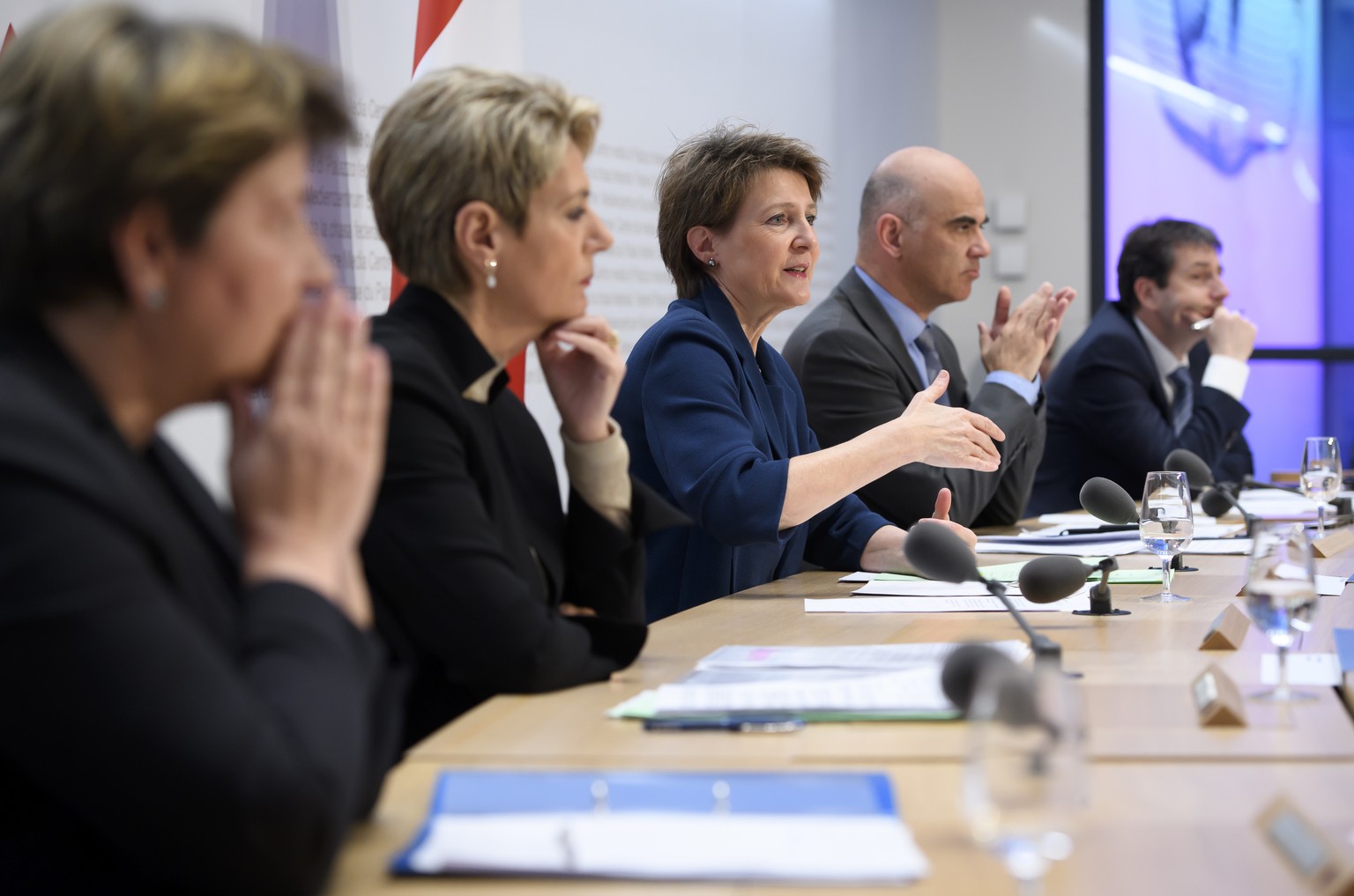Swiss Federal president Simonetta Sommaruga, center, briefs the media about the latest measures to fight the Covid-19 Coronavirus pandemic, next to Swiss Federal councillor Viola Amherd, Swiss Federal ...