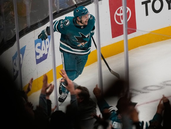 San Jose Sharks center Philipp Kurashev celebrates after scoring the winning goal during overtime of an NHL hockey game against the Colorado Avalanche in San Jose, Calif., Saturday, Nov. 1, 2025. (AP  ...