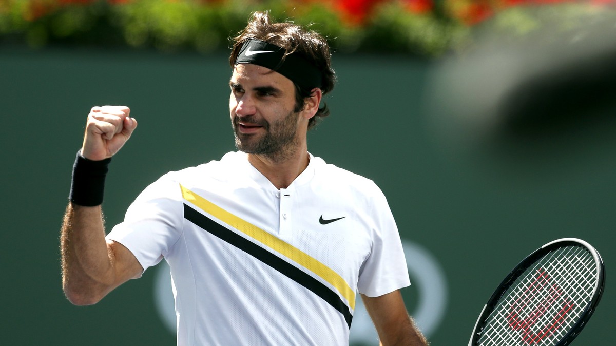 epa06610958 Roger Federer from Switzerland celebrates after defeating Borna Coric from Croatia at their semi-final match the BNP Paribas Open at the Indian Wells Tennis Garden in Indian Wells, Califor ...