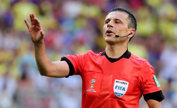 epa06847520 Referee Milorad Mazic of Serbia reacts during the FIFA World Cup 2018 group H preliminary round soccer match between Senegal and Colombia in Samara, Russia, 28 June 2018.

(RESTRICTIONS  ...