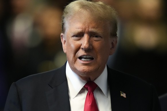 Former President Donald Trump speaks to members of the media upon arriving at Manhattan Criminal Court, Tuesday, May 28, 2024, in New York. (AP Photo/Julia Nikhinson, Pool)