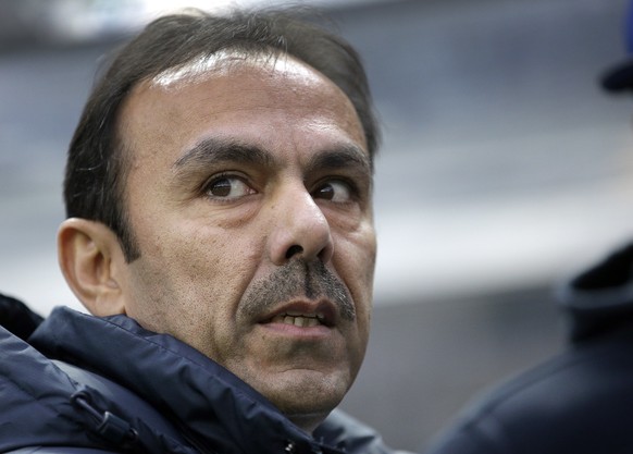 FILE-- In this Nov. 29, 2014 file photo Berlin's head coach Jos Luhukay from the Netherlands attends the warm up for the German Bundesliga soccer match between Hertha BSC and FC Bayern Munich at the Olympia stadium in Berlin.  Luhukay was dismissed from his post on Thursday Feb.5,2015. (AP Photo/Michael Sohn)