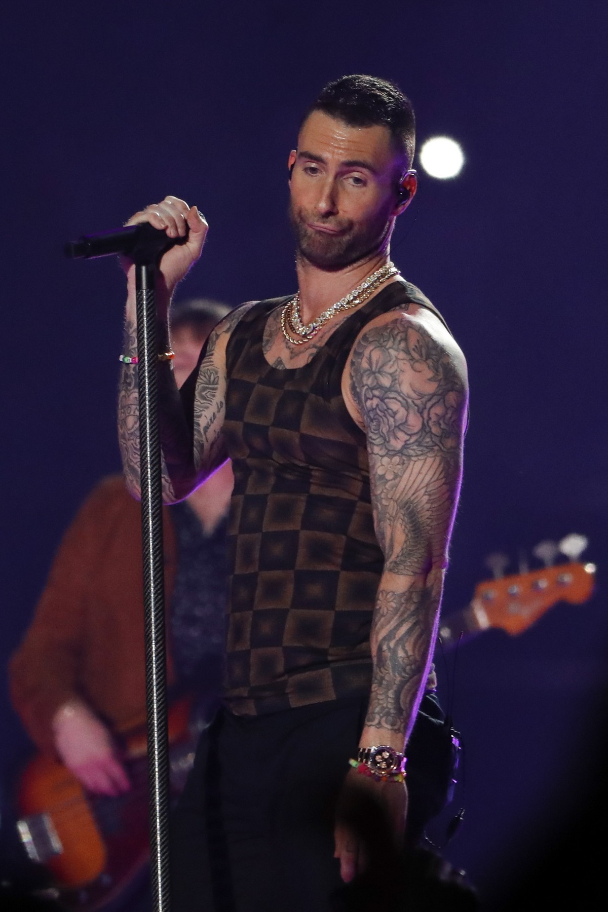 epa07341556 Maroon 5's Adam Levine performs during the half time show of Super Bowl LIII between the New England Patriots and the Los Angeles Rams at Mercedes-Benz Stadium in Atlanta, Georgia, US ...