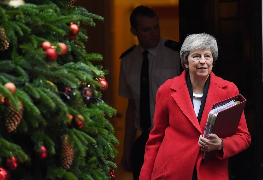 epa07209581 British Prime Minister Theresa May departs 10 Downing Street in London, Britain, 05 December 2018. Prime Minister Theresa May is holding five days of debate over Brexit at parliament hopin ...