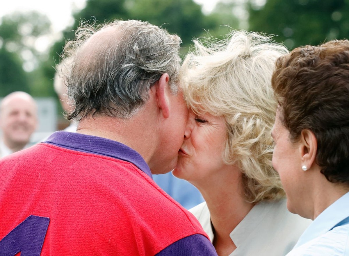 CIRENCESTER, UNITED KINGDOM - JUNE 17: (EMBARGOED FOR PUBLICATION IN UK NEWSPAPERS UNTIL 24 HOURS AFTER CREATE DATE AND TIME) Prince Charles, Prince of Wales kisses Camilla, Duchess of Cornwall as she ...