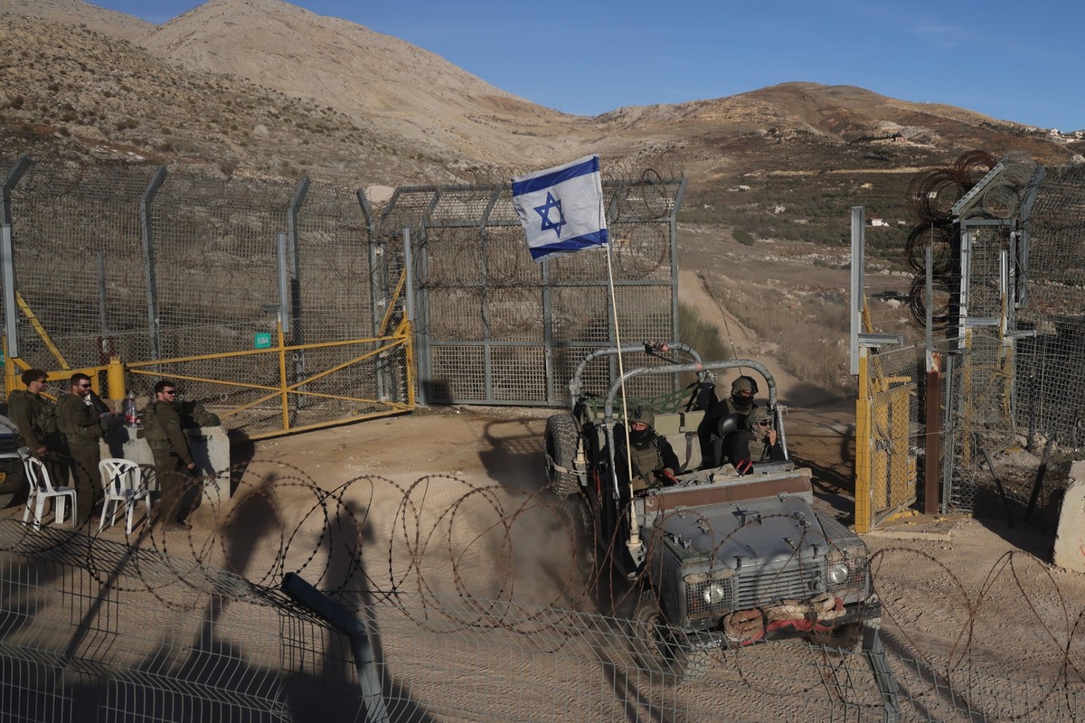 241216 -- BEIJING, Dec. 16, 2024 -- Israeli troops are seen near the buffer zone in the Golan Heights, on Dec. 15, 2024. The Israeli government approved a plan on Sunday to expand settlements in the G ...
