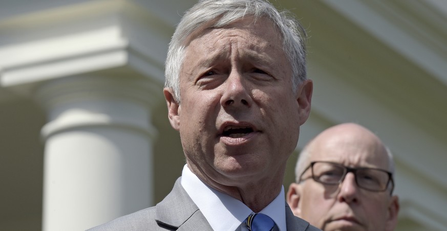 FILE -Rep. Fred Upton, R-Mich., left, speaks to reporters outside the White House in Washington, May 3, 2017. Upton, who voted to impeach President Donald Trump over the Capitol insurrection, announce ...