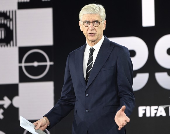 epa08890349 Former Arsenal manager Arsene Wenger (C) speaks to host Ruud Gullit during the Best FIFA Football Awards virtual TV show broadcast from the FIFA headquarters in Zurich, Switzerland, 17 Dec ...