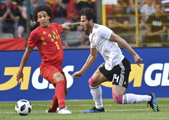 Belgium&#039;s Axel Witsel battles for control with Egypt&#039;s Ramadan Sobhi during a friendly soccer match between Belgium and Egypt at the King Baudouin stadium in Brussels, Wednesday, June 6, 201 ...