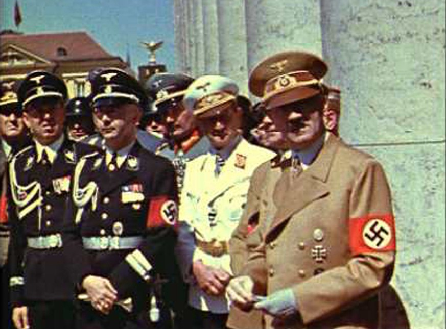 This scene of Adolf Hitler and Nazi officials in Munich in the summer of 1939 -- just before the start of World War II, supplied by C.Cay Wesnigk Film, is from &quot;Hitler&#039;s Hit Parade,&quot; a  ...