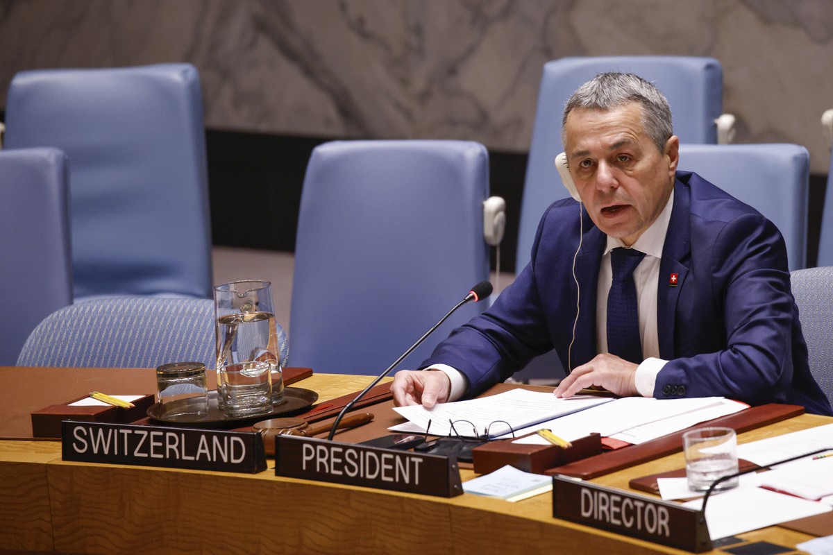 Ignazio Cassis (L) Federal Councillor and Head of the Federal Department of Foreign Affairs of Switzerland speaks during a United Nations Security Council meeting on the situation in the Middle East,  ...