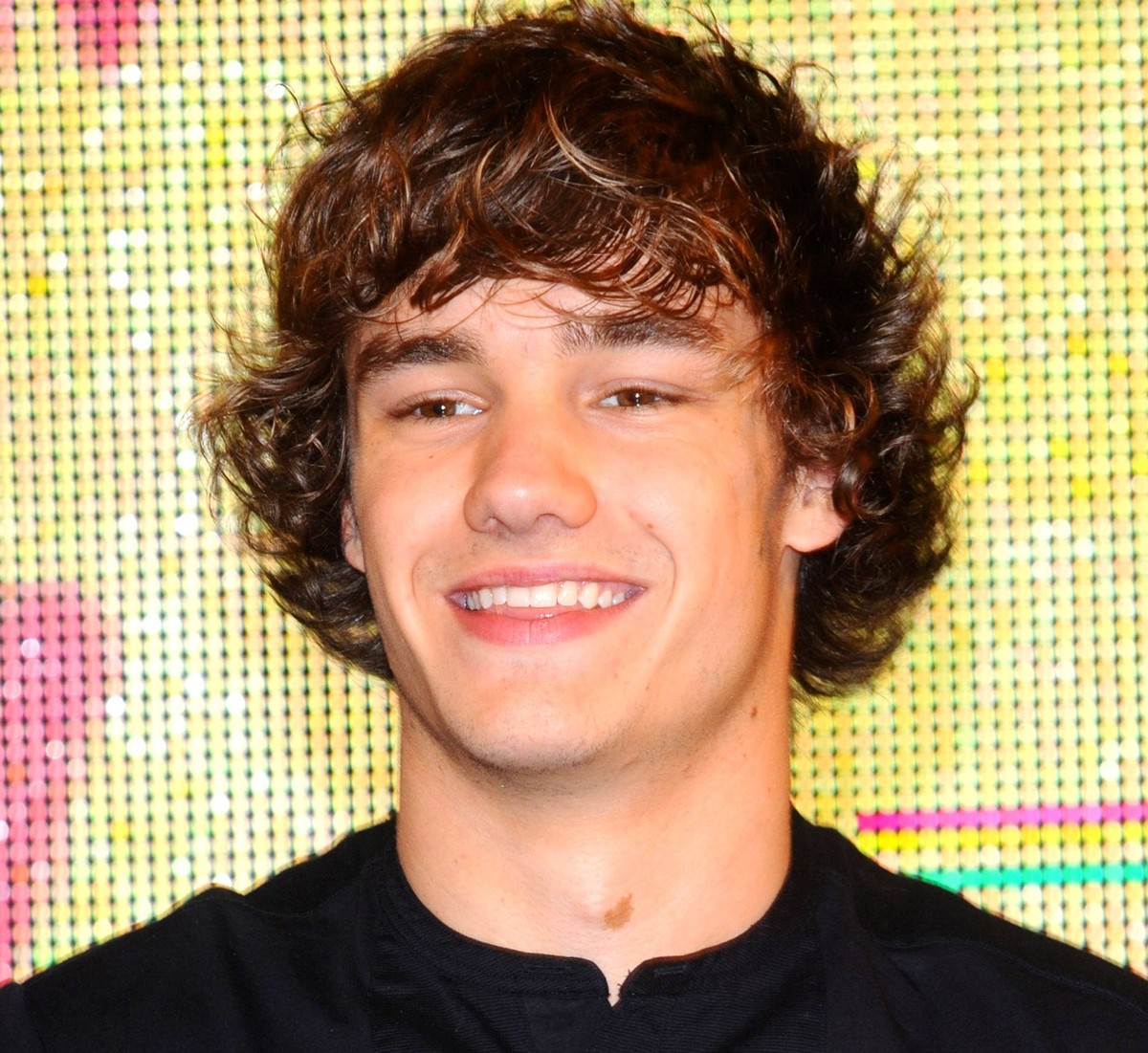 Liam Payne of One Direction sign copies of their new single What Makes You Beautiful at HMV Oxford Street in London - 11 September 2011 FAM42381 Copyright: x FAMOUSx 33545406