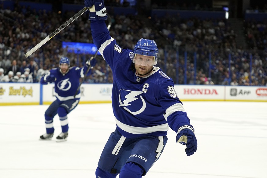 Tampa Bay Lightning center Steven Stamkos (91) celebrates his goal against the Toronto Maple Leafs during the second period of an NHL hockey game Thursday, April 21, 2022, in Tampa, Fla. With the goal ...