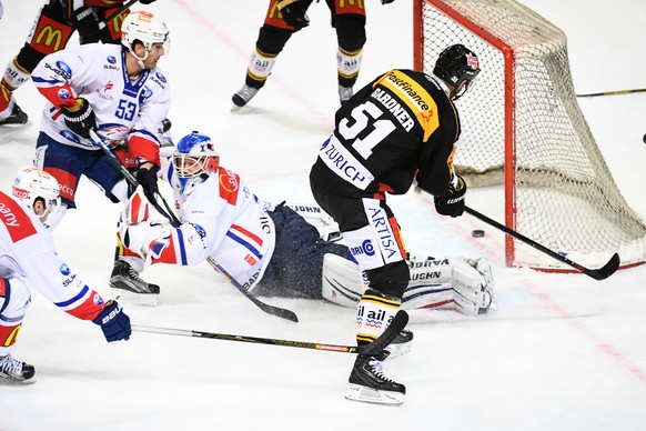 Luganoâs player Ryan Gardner scores 2-1 goal during the second leg of the Playoffs quarterfinals game of National League A (NLA) Swiss Championship between Switzerland&#039;s HC Lugano and ZSC Lions ...