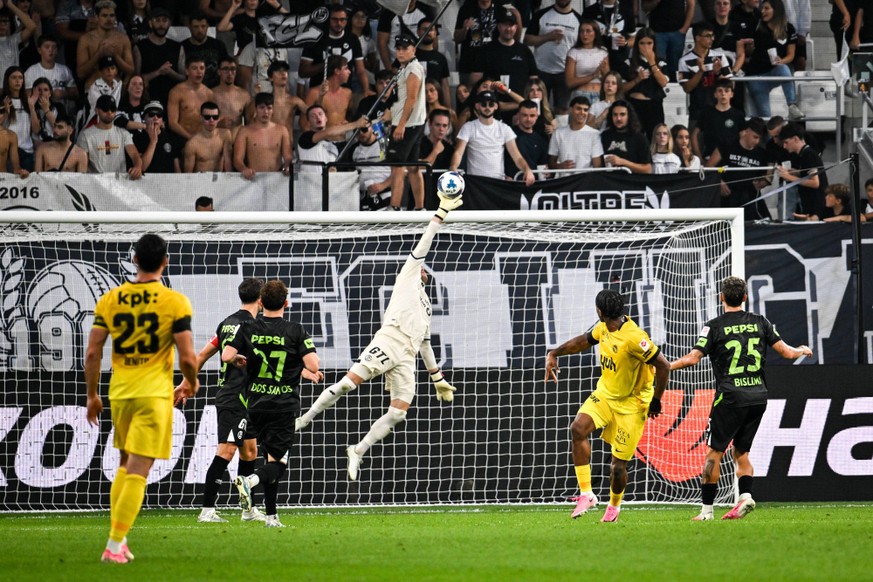 LUGANO, SWITZERLAND - SEPTEMBER 12: goalkeeper David von Ballmoos of Lugano makes a save on Samuel Essende of Young Boys during the Swiss Super League football match between FC Lugano and Young Boys a ...