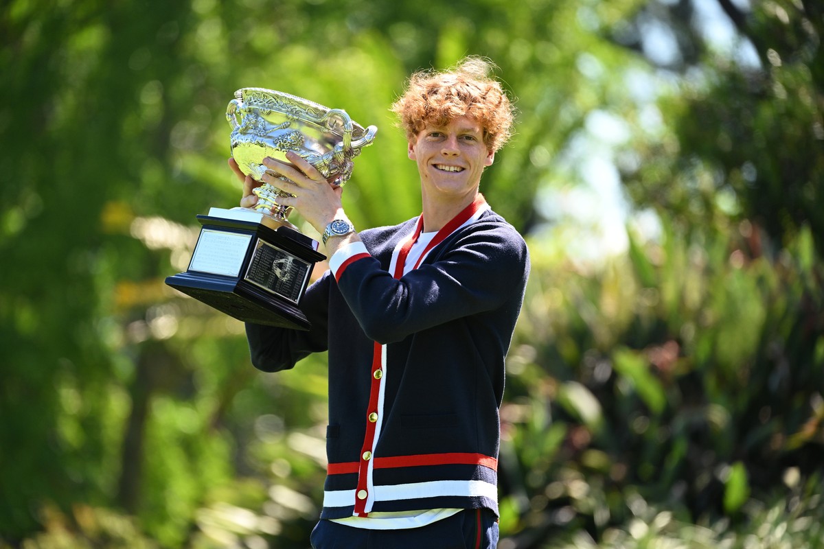 epa11111785 Jannik Sinner of Italy poses for a photograph with the Norman Brookes Challenge Cup following his win over Daniil Medvedev of Russia in the Men?s Singles Final at the 2024 Australian Open  ...