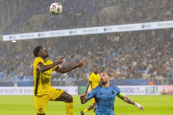 epa12314895 Guram Kashia of Bratislava in action against Chris Bedia of Young Boys during the UEFA Europa League play-offs, 1st leg match between Slovan Bratislava and Young Boys in Bratislava, Slovak ...