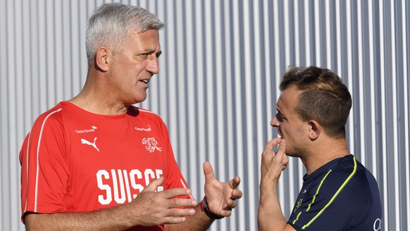 epa06834442 Switzerland&#039;s head coach Vladimir Petkovic (L) speaks with his midfielder Xherdan Shaqiri during a training session of Switzerland&#039;s national soccer team at the Torpedo Stadium,  ...