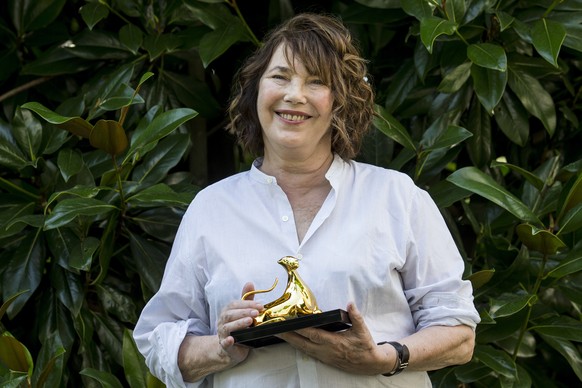 Jane Birkin, British actress and singer, poses during a photocall where she received the award &quot;Pardo alla carriera&quot; of the 69th Locarno International Film Festival, Thursday, August 04, 201 ...