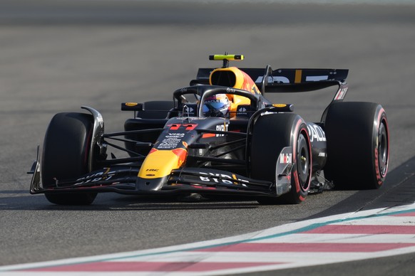 Red Bull driver Sergio Perez of Mexico in action during the practice ahead of the Formula One Abu Dhabi Grand Prix at the Yas Marina Circuit in Abu Dhabi, UAE, Saturday, Dec. 7, 2024. (AP Photo/Altaf  ...