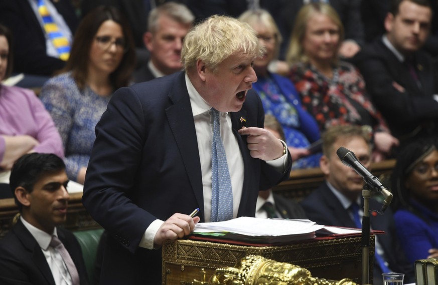 In this handout photo provided by UK Parliament, Britain&#039;s Prime Minister Boris Johnson speaks during Prime Minister&#039;s Questions in the House of Commons in London, Wednesday, March 30, 2022. ...