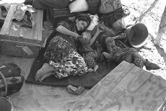 Jüdische Flüchtlinge aus dem Irak nach ihrer Ankunft in Israel, 1951
https://de.wikipedia.org/wiki/Pal%C3%A4stinakrieg#/media/Datei:Iraqi_jews_displaced_1951.jpg