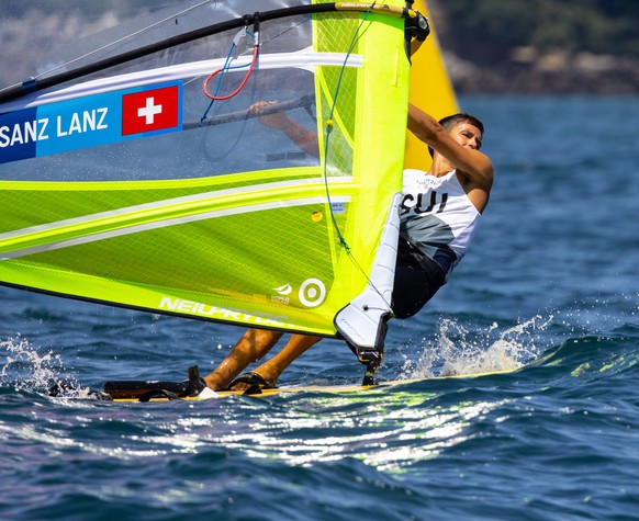 epa09364300 Swiss windsurfer Mateo Sanz Lanz competes in the in the Men's RS:X Windsurfing discipline of the the Sailing events of the Tokyo 2020 Olympic Games in Enoshima, Japan, 25 July 2021. EPA/CJ ...