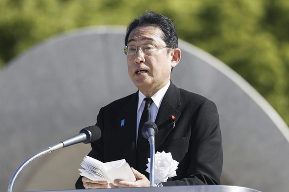 Japan&#039;s Prime Minister Fumio Kishida delivers a speech during a ceremony marking the 78th anniversary of the world&#039;s first atomic bombing at the Hiroshima Peace Memorial Park in Hiroshima, w ...