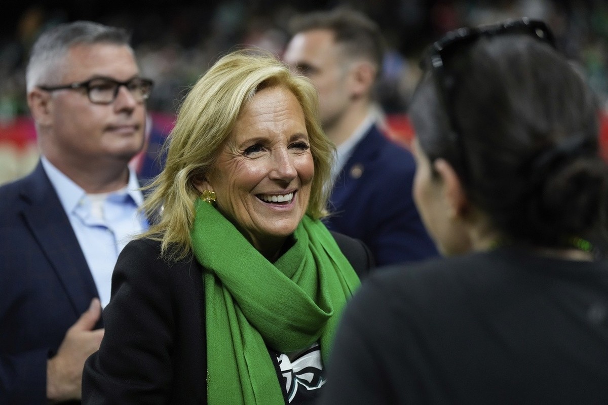 Former first lady Jill Biden smiles on the field before the NFL Super Bowl 59 football game between the Kansas City Chiefs and the Philadelphia Eagles, Sunday, Feb. 9, 2025, in New Orleans. (AP Photo/ ...