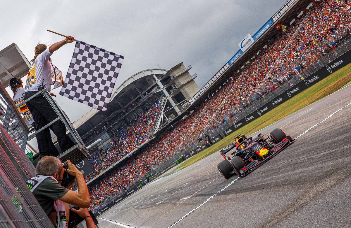 Red Bull driver Max Verstappen of the Netherland's crosses the finish line to win the German Formula One Grand Prix at the Hockenheimring racetrack in Hockenheim, Germany, Sunday, July 28, 2019.  ...