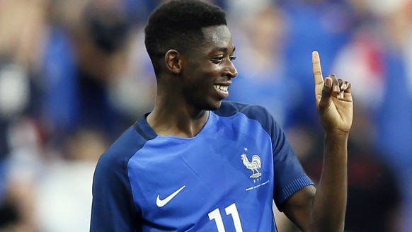 France&#039;s Ousmane Dembele reacts after scoring his side&#039;s 3rd goal during a friendly soccer match between France and England at the Stade de France in Saint Denis, north of Paris, France, Tue ...