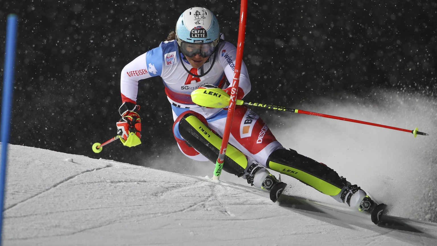 Switzerland&#039;s Wendy Holdener speeds down the course during an alpine ski, women&#039;s World Cup slalom in Flachau, Austria, Tuesday, Jan. 12, 2021. (AP Photo/Marco Trovati)