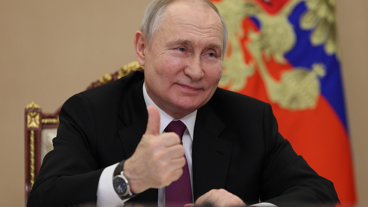 epa10667473 Russian President Vladimir Putin attends a meeting with families awarded Orders of Parental Glory via teleconference call at Kremlin in Moscow, Russia, 01 June 2023. Children's Day is ...