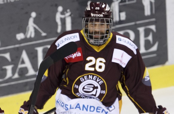 Geneve-Servette&#039;s defender Arnaud Jacquemet, left, celebrates his goal with teammates forward Daniel Winnik #26, of Canada, and defender Henrik Toemmernes, of Sweden, right after scoring the 1:1, ...