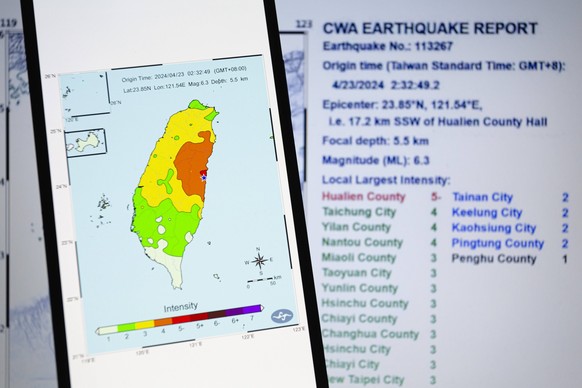 April 22, 2024, Asuncion, Paraguay: The seismic intensity map of the Central Weather Administration CWA of Taiwan is displayed on a smartphone backdropped by its earthquake report. Taipei, Taiwan - Tw ...