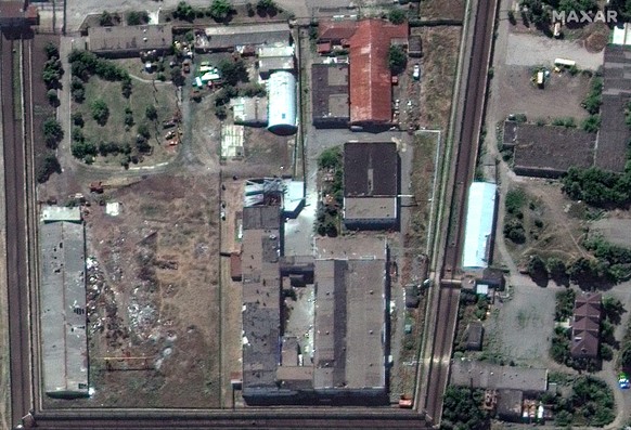 In this satellite photo provided by Maxar Technologies, a view of the Olenivka detention center, in Eastern Donetsk province, after an attack on the prison reportedly killed Ukrainian soldiers capture ...