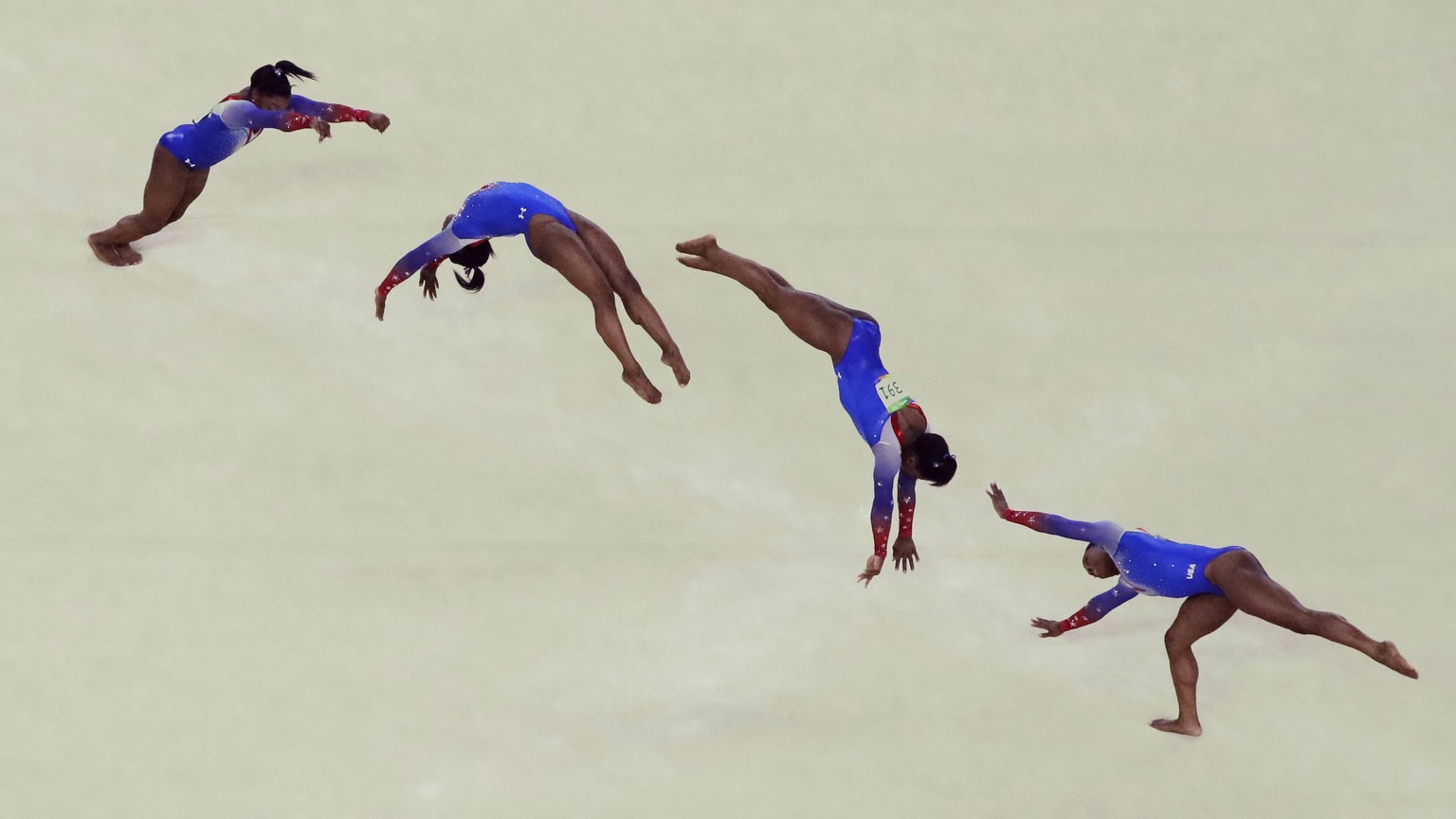 In this multiple exposure photo, United States&#039; Simone Biles performs on the floor during the artistic gymnastics women&#039;s apparatus final at the 2016 Summer Olympics in Rio de Janeiro, Brazi ...