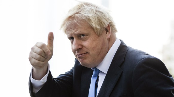TILE - British Prime Minister Boris Johnson gestures as he departs from Hudson Yards, in New York, Tuesday, September 24, 2019. He was the mayor who enjoyed the glory of hosting the London...