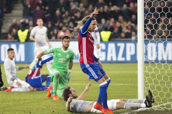 epa06344696 Basel&#039;s Michael Lang celebrates his goal during the UEFA Champions League Group stage Group A matchday 5 soccer match between Switzerland&#039;s FC Basel 1893 and England&#039;s Manch ...