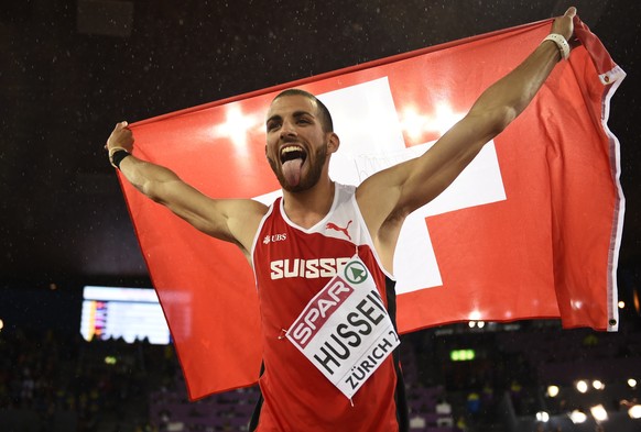 Was für ein Triumph: Hussein gewinnt Gold über 400 Meter Hürden.