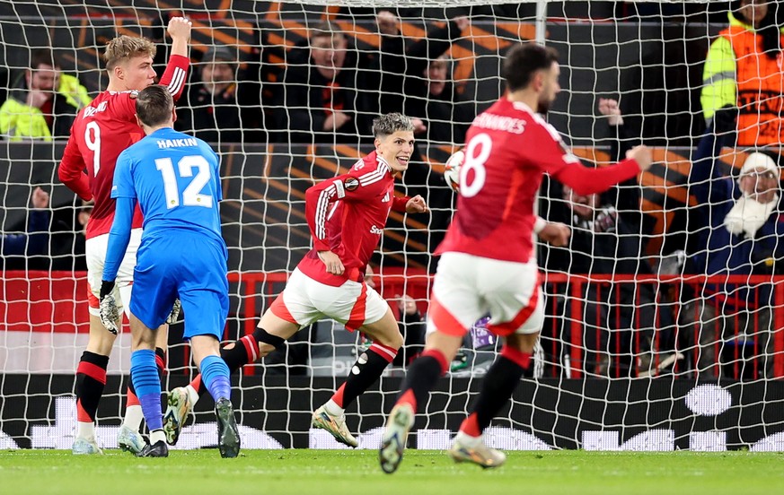 epa11746290 Alejandro Garnacho (C) of Manchester United celebrates after scoring the opening goal during the UEFA Europa League match between Manchester United and Bodo/Glimt in Manchester, Great Brit ...